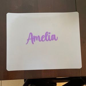 FREE “Amelia” placemat with any purchase. NEVER USED.